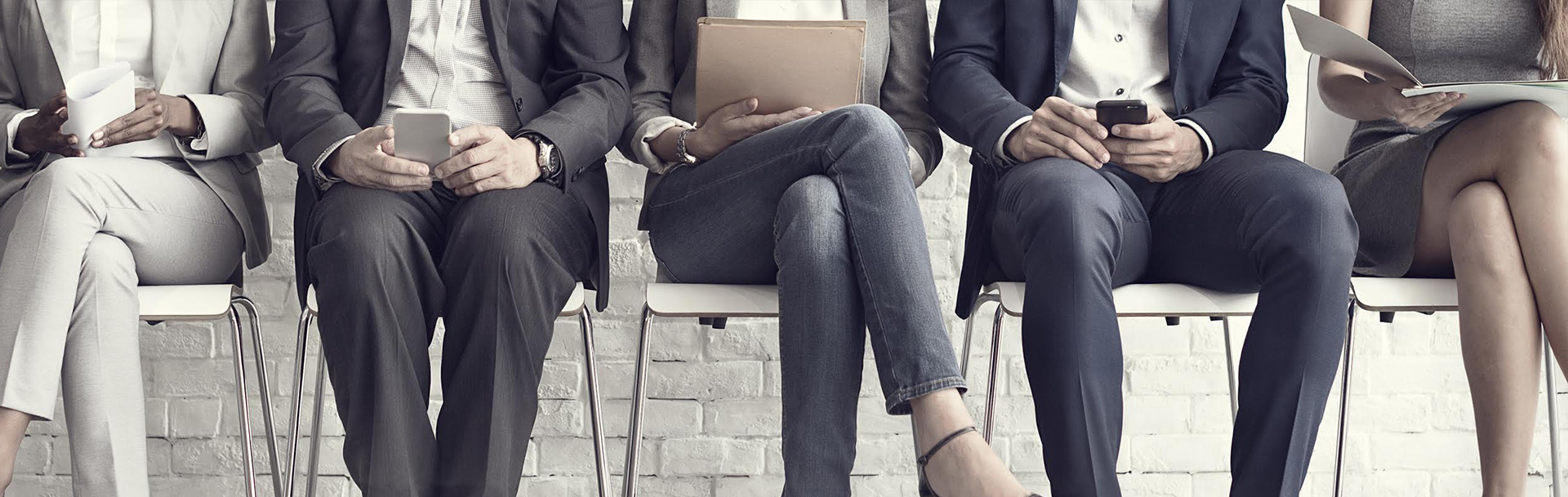 Abstract image of business people sitting